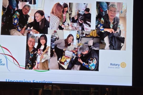 會上播出同學參與跨代共融活動的相片